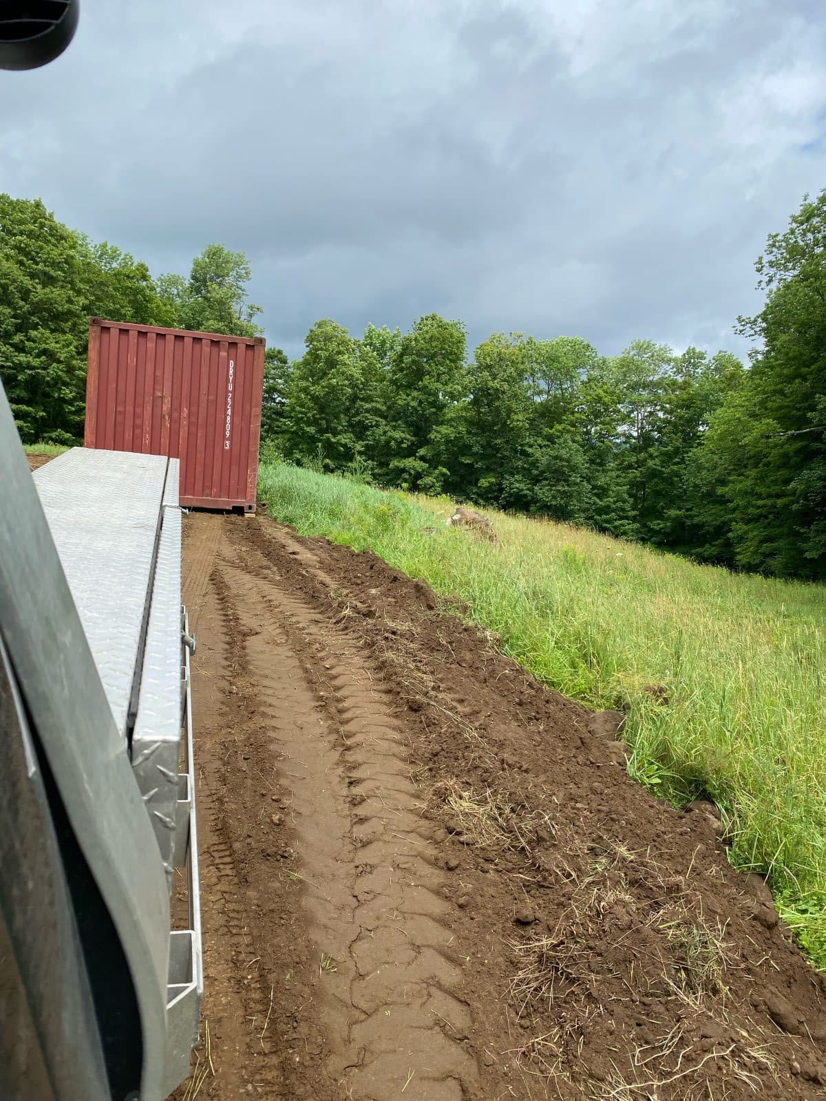 Trapp Rentals and Storage container delivery to a rural NH/VT property