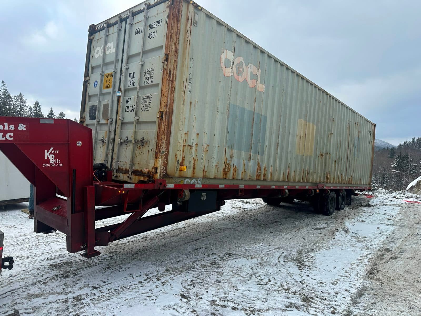 40' container delivered up a snowy mountain road